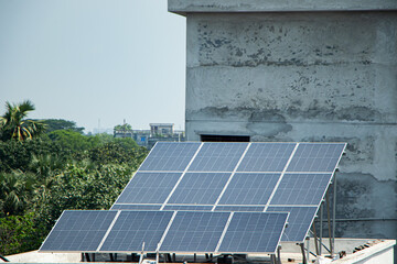 Obraz premium Pile of solar panel on rooftop. Green energy, ecological electricity, renewable energy concept or clean Alternative power energy concept.