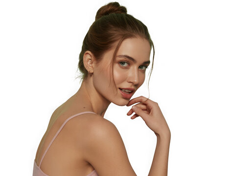 Beautiful woman with brown hair in a bun posing for a beauty photography shot