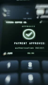 POS terminal indicates a successful financial transaction