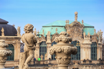 Obraz premium Cityscape - view of the balustrade with sculptures of vases and cupids of the Zwinger palatial complex in Dresden, Saxony, Germany