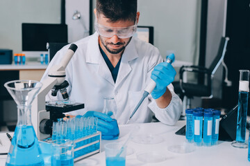 Fototapeta premium Lab technician experimenting in lab