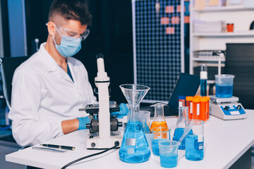 Fototapeta premium Lab technician experimenting in lab