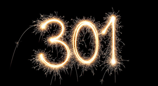 Vibrant sparklers forming the number 301, creating a celebratory and eye-catching visual effect on a dark backdrop.