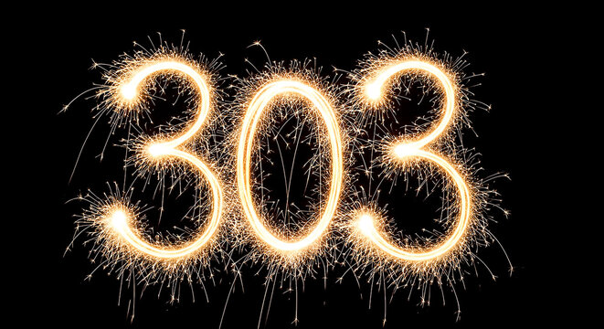 Vibrant sparkler display creating the number 303, ideal for celebrations, milestones, or creative projects.