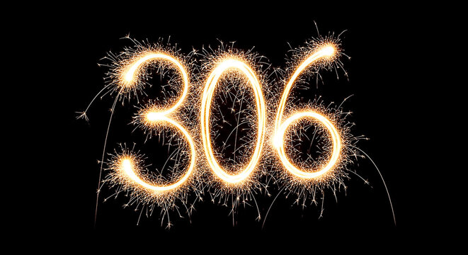 Vibrant sparklers forming the illuminated number 306 against a dark backdrop, evoking celebration and festivity.