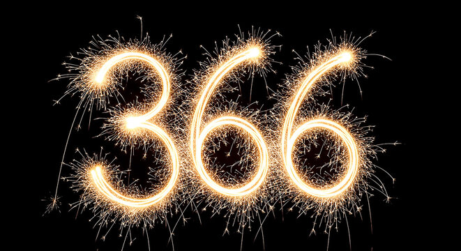 Dramatic firework sparklers arranged in the shape of the number 366 against a dark night sky, evoking celebration and festivity.