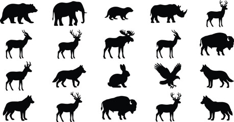 Fototapeta premium Assortment of wild animal silhouettes including deer moose bison elephants and foxes
