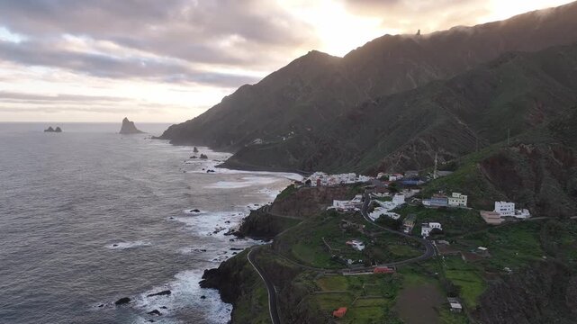 Sunrise aerial view of Alm&aacute;ciga village and rugged Atlantic coastline in Anaga, Tenerife, Canary Islands, Spain