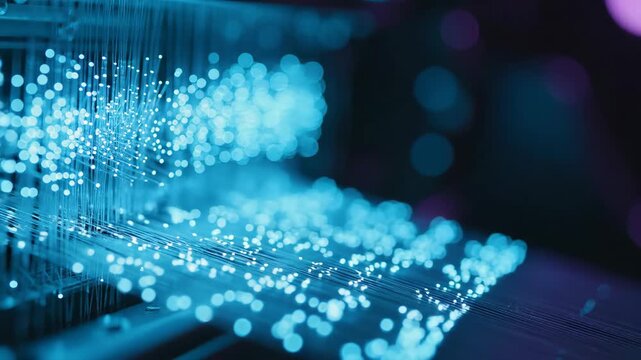 Fiber optic light strands transmitting data pulses. Close up of glowing cable network infrastructure. Digital connectivity technology for high speed internet system