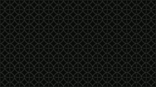 Abstract circular geometric pattern animation over dark textured surface in motion footage.