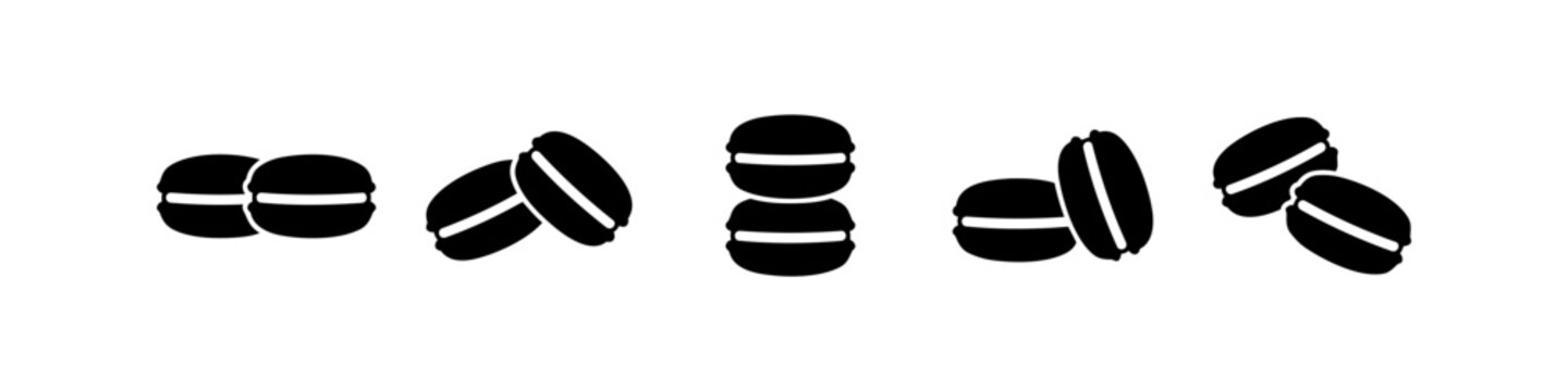 Set of black macaron silhouettes in different arrangements on a white background. Minimalist vector illustration of French dessert cookies, ideal for bakery menus and logo design.