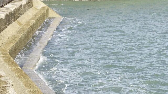 High tide flooding concrete harbor steps 4K