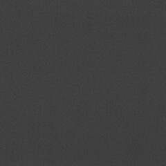 Dark gray textured fabric background with a soft, matte finish