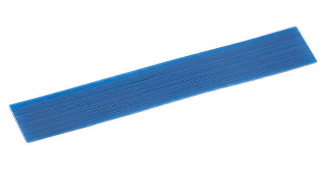 Blue plastic shim for construction leveling, industrial spacer wedge for window installation, durable plastic leveling tool on white background