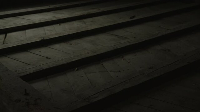 Dark Wooden Attic Floorboards in Low Light