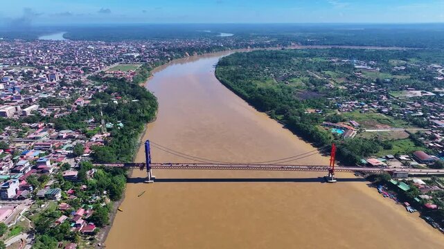 Aerial view of Billinghurst Bridge over Madre de Dios River in Puerto Maldonado, Peru
