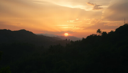 Obraz premium Radiant sunset over jungle hills and lush forest