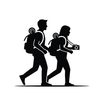 Couple walking with backpacks and camera.