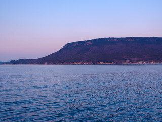 Naklejka premium Evening seascape of the Seto Inland Sea and Yashima in Takamatsu, Kagawa Prefecture, Japan