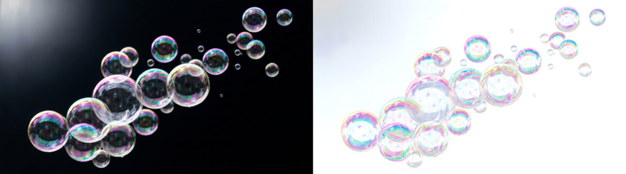 Floating soap bubbles with rainbow reflection isolated on transparent background
