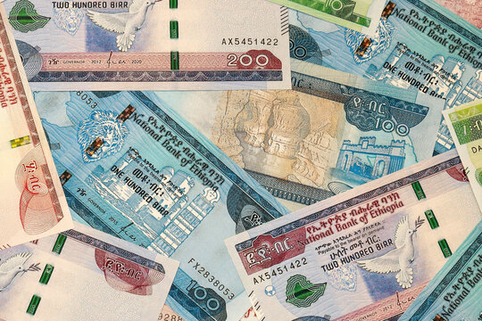 Ethiopian birr money bills in pile on table. Ethiopia ETB currency cash close up