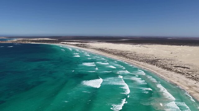 Scott Bay, Fowlers Bay, South Australia &ndash; 4K aerial drone view of Great Australian Bight coastline, turquoise ocean, sand dunes, jetty, white sand beach and limestone cliffs