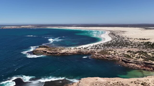 Scott Bay, Fowlers Bay, South Australia &ndash; 4K aerial drone view of Great Australian Bight coastline, turquoise ocean, sand dunes, jetty, white sand beach and limestone cliffs