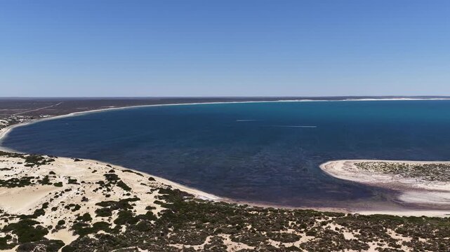 Scott Bay, Fowlers Bay, South Australia &ndash; 4K aerial drone view of Great Australian Bight coastline, turquoise ocean, sand dunes, jetty, white sand beach and limestone cliffs