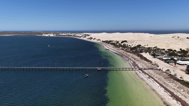 Scott Bay, Fowlers Bay, South Australia &ndash; 4K aerial drone view of Great Australian Bight coastline, turquoise ocean, sand dunes, jetty, white sand beach and limestone cliffs