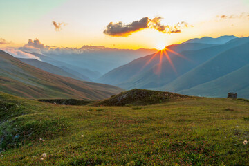 Obraz premium Western Asia, South Caucasus, Republic of Georgia,Samegrelo-Zemo Svaneti, Koruldashi, Racha-Lechkhumi and lower Svaneti. The southern slopes of the central Caucasus Mountains, at sunset.