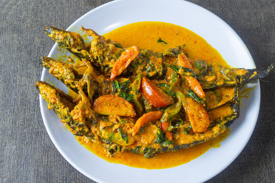 Homemade spicy Mangut Lele, a flavorful Javanese fish dish cooked in a savory, spicy, and spice rich coconut milk sauce