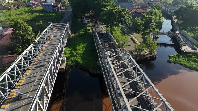 A view from above the two steel bridges spanning the Kapuas River in West Borneo, Indonesia.