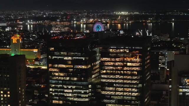 Corporate Buildings In Rio De Janeiro Brazil. Illuminated Ferris Wheel Landscape. Downtown District. Highrise Buildings. Corporate Buildings In Rio De Janeiro Brazil. Night Life Tourism.