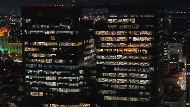 Corporate Buildings In Rio De Janeiro Brazil. Illuminated Ferris Wheel Landscape. Downtown District. Highrise Buildings. Corporate Buildings In Rio De Janeiro Brazil. Night Life Tourism.