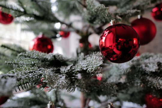 Beautiful deep red Christmas Holiday ornaments in a upper class private home