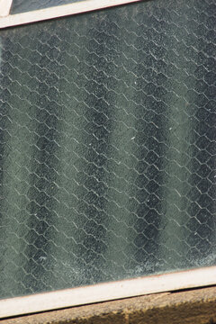 chicken wire reinforced glass window
