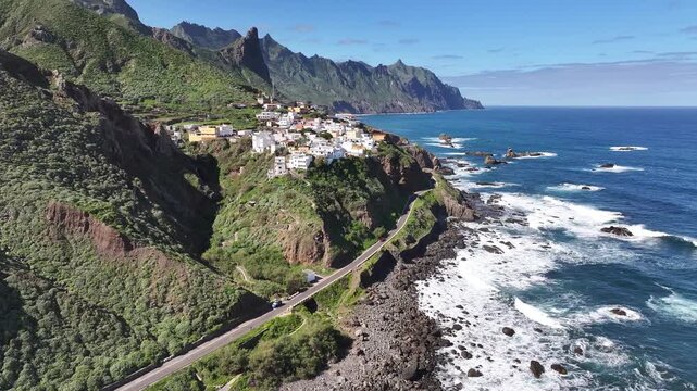 Drone aerial view of Alm&aacute;ciga village and Roque de las &Aacute;nimas coastline in Anaga, Tenerife, Canary Islands, Spain