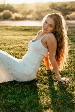 girl in park in a white dress