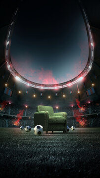 Green grass armchair and balls on a soccer field in a stadium at night