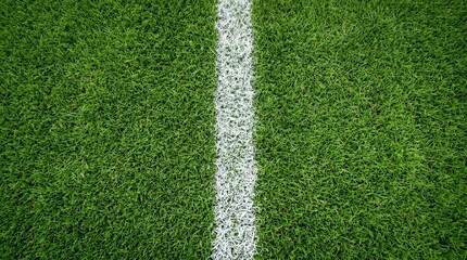 Fototapeta premium Close-up View of a Green Soccer Field Grass and White Line Texture