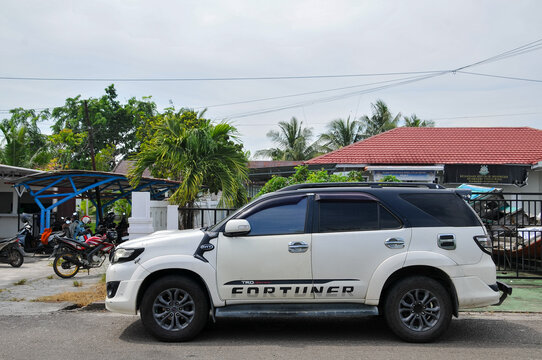 White Large SUV Toyota Fortuner TRD Sportivo Parked Sideways on an Urban Street On june 9th 2026 