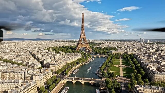 Aerial drone perspective of the Eiffel Tower and Seine River in Paris with dramatic clouds at sunset