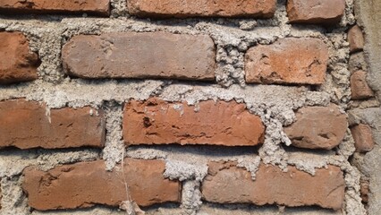 Obraz premium Traditional Red Brick Wall Texture with Cement Mortar
