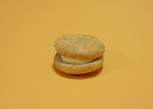 A plain cream macaron dessert, French macaron