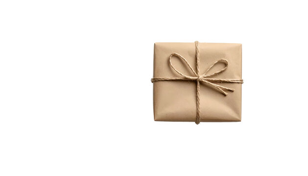 A square package wrapped in brown paper tied with twine, creating a rustic aesthetic against a stark black background