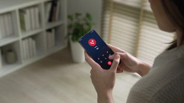 Woman calling emergency number 911 for crisis situation