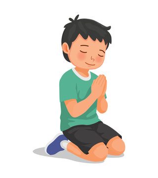 Little boy praying kneeling on his knee on the floor