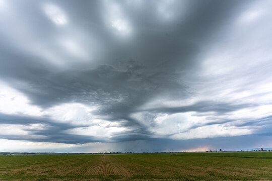 Dark thunderclouds covering the sky above Bavaria Germany showcasing powerful weather conditions and an approaching storm front