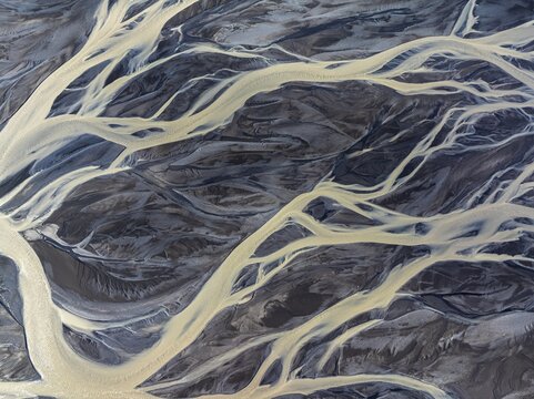Overgrown river landscape, drone shot, Sudurland, Iceland