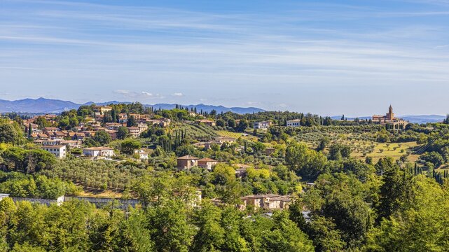 The village of tavern dArbia in hilly countryside, Tuscany, Italy